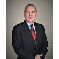 Kurt McAdams/ Baird & Warner Real Estate Logo