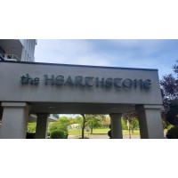 The Hearthstone Retirement Living at Green Lake Logo