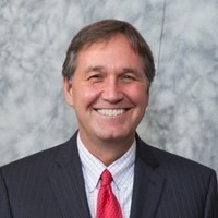 William W. McCartney, Jr. Logo