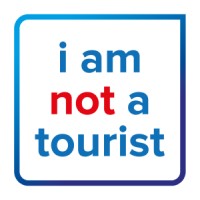 i am not a tourist Expat Fairs & Expat Survival Guide Logo