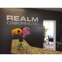Realm Chiropractic Logo