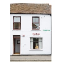 Heslops Chartered Accountants Logo
