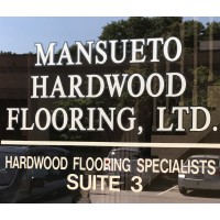 Mansueto Hardwood Flooring, Ltd. Logo