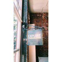 Explore Communications Logo