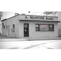 The A. Mancini Realty Logo