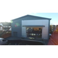 B & R Carpets and Furniture Logo