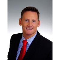 President/Managing Broker, Acquired Realty & Investments Logo