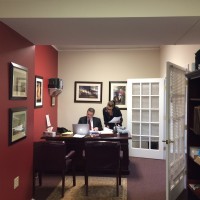 Law Offices of Michael Pollok, PLLC Logo