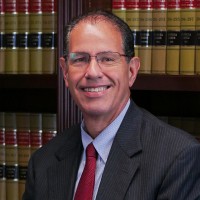 Robert E. Gluck, P.A. Logo