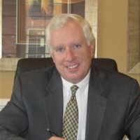 Law Offices of Michael J. Brennan Logo