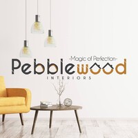 Pebblewood Interiors Pvt Ltd Logo