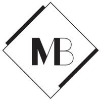 Marius Blom Inc. Logo