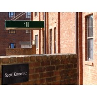 SCOTT KRONER PLC Logo