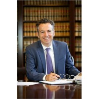 Wallis Law Firm, PLLC Logo