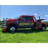HOOKED UP TOWING AND RECOVERY Logo