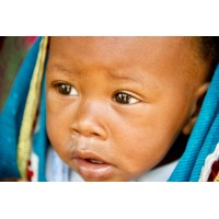AFRICAN MOTHERS HEALTH INITIATIVE Logo