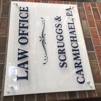 Scruggs & Carmichael, P.A. Logo