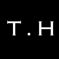 T. HUXLEY Logo