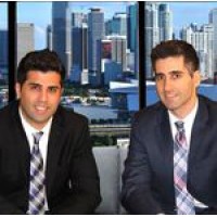 National Net Lease Brokers - The Ben-Moshe Brothers of Marcus and Millichap Logo