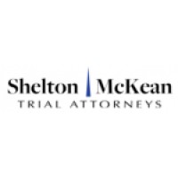 Shelton | McKean - Trial Attorneys Logo