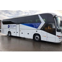 McCombs Coach Travel Logo