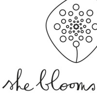 She Blooms Logo