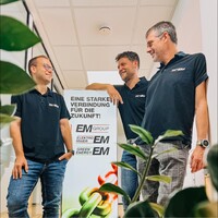 EM - GROUP Logo