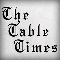 The Table Times Inc. Logo