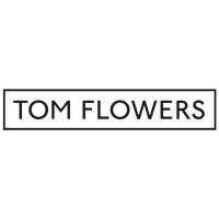 TOM FLOWERS Logo