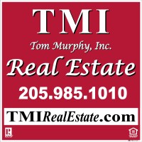 TMI REAL ESTATE Logo