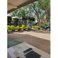 Vienna Woods Holiday Inn Hotel Nakuru Logo