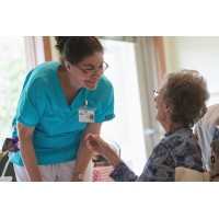 Hospice of Lansing & Stoneleigh Residence Logo