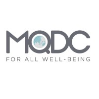 MQDC - Magnolia Quality Development Corporation Logo