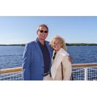 Susan Benson, Broker & Mark Benson, Sales Representative, Royal LePage, Lakes of Muskoka, Brokerage Logo