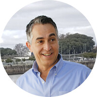 Tomasco, multigráfica Logo