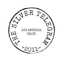 The Silver Telegram Logo