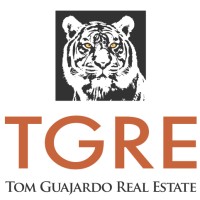Tom Guajardo Real Estate Logo