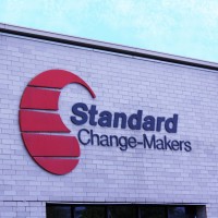 Standard Change-Makers - Div. of RKU Standard Incorporated Logo
