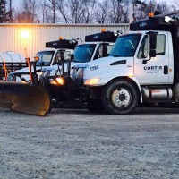 Curtis Contracting, Inc. Logo