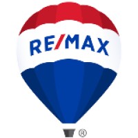 RE/MAX AT THE LAKE Logo