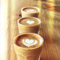 Travellers House Coffee & Tea Logo