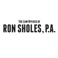 The Law Offices of Ron Sholes, P.A. Logo