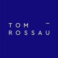 TOM ROSSAU Logo