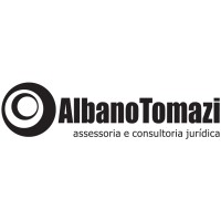 Albano Tomazi Assessoria e Consultoria Jurídica Logo