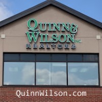 Quinn & Wilson Inc Realtors Logo