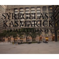 Syregelas & Kasmarick LLC Logo