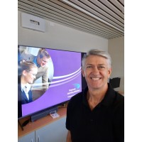 Greg Kinnaird - Corporate Learning Solutions Logo