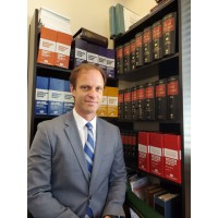 Law Offices of Jon. H. Freis Logo