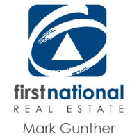 First National Real Estate Mark Gunther Logo
