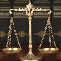 Hidalgo-Bouzas Abogados Logo